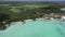 Aerial panning left from Anse La Raie Beach via St Francois Public Beach to Calodyne - aerial video view of Mauritius north coast