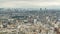 Aerial panorama above houses rooftops in a Paris timelapse