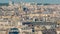 Aerial panorama above houses rooftops in a Paris timelapse