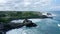 Aerial panorama of the beach of Batu Bolong, Bali, Indonesia