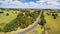 Aerial panorama of beautiful countryside. Trees, pastures, field