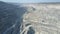 Aerial panorama cascade asbestos quarry and excavator