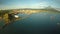 Aerial panorama of the city of Legaspi in the morning at dawn. Against the backdrop of the Mayon volcano. Seaport with