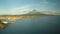 Aerial panorama of the city of Legaspi in the morning at dawn. Against the backdrop of the Mayon volcano. Seaport with