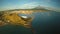 Aerial panorama of the city of Legaspi in the morning at dawn. Against the backdrop of the Mayon volcano. Seaport with