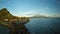 Aerial panorama of the city of Legaspi in the morning at dawn. Against the backdrop of the Mayon volcano. Seaport with