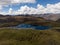 Aerial panorama of Cordillera Huayhuash Circuit andes alpine mountain lake Laguna Alcaycocha Ancash Peru South America