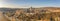 Aerial panorama drone shot of Buda Castle palace facade on hill in Budapest sunrise glow