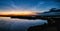 Aerial panorama Early Sunrise over Northern Sweden. Noctilucent night clouds, summer foggy lake reflects sky