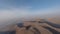 Aerial panorama high view cinematic mountain valley canyon desert rocky terrain