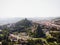 Aerial panorama of historic architecture town Le Puy-en-Velay church on hill Haute Loire Auvergne Rhone Alpes France