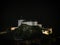 Aerial panorama of illuminated medieval Castle Festung Kufstein Fortress at night in town Tyrol Austria alps Europe