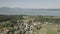 Aerial panorama. Lake Chiemsee, Bavaria, in summer. Flight over little town Ising.