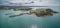 Aerial panorama of the lookout point where people watch for whales and wharf in Eden, NSW, Australia.