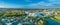 Aerial panorama of luxury real estate at Varsity Lakes suburb.