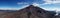 Aerial panorama of the majestic chimborazo vulcano in Ecuador showing the full vulcano with snow at the summit