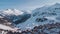 Aerial panorama of Meribel village, on the end of the valley in the french Alps. Beautiful panorama of ski slopes and chalets with