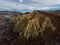 Aerial panorama of Omarama Clay Cliffs geological natural erosion silt and sand rock formation in Canterbury New Zealand