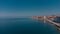 Aerial panorama of picturesque city of Piran at the heart of Slovenian istria on a sunny day. Calm sea and blue skies