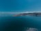 Aerial panorama of picturesque city of Piran at the heart of Slovenian istria on a sunny day. Calm sea and blue skies