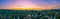 Aerial panorama of Port Phillip Bay and Frankston suburb at sunset.