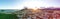 Aerial panorama of Recreio dos Bandeirantes during sunset, with all the residential buildings forming a grid pattern