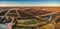 Aerial panorama of rectangles of vineyards in Monash.