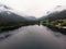 Aerial panorama reflection of alpine mountain lake Hintersee clouds mood Ramsau Berchtesgadener Land Bavaria Germany