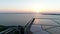 Aerial panorama of the salt pans of Trapani in Sicily at sunset over the sea