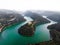 Aerial panorama of Sant Pere de Casserres cloister monastery isolated church on hill at Ter river bend Catalonia Spain