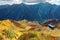 Aerial panorama of a scenic cable car flying over the beautiful autumn valley in Tateyama Kurobe Alpine Route, Toyama Japan