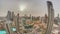 Aerial panorama with sunrise over big futuristic city timelapse. Business bay and Downtown