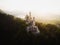 Aerial panorama sunset view of bavarian alpine mountain landscape with Neuschwanstein fairytale castle Fuessen Germany