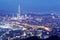 Aerial panorama of Taipei downtown & suburbs at dusk with view of Keelung Riverside Park