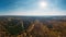 Aerial panorama view from above of nature landscape with forest and rural countryside, beautiful scenery landmark