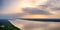 Aerial panorama view of the Amazon River and forest at sunset