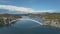 Aerial panorama view with bridge and sea around islands. Beautiful landscape surrounded with blue sea with bridge.