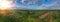 Aerial panorama view of countryside with windmills, Agriculture fields and different variety of harvest, Panaramic view of forest