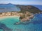 Aerial panorama view of the famous semicircular sandy beach and lagoon of Voidokilia in Messenia, Greece