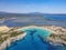 Aerial panorama view of the famous semicircular sandy beach and lagoon of Voidokilia in Messenia, Greece