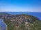 Aerial panorama view of the famous semicircular sandy beach and lagoon of Voidokilia in Messenia, Greece