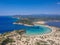 Aerial panorama view of the famous semicircular sandy beach and lagoon of Voidokilia in Messenia, Greece