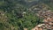 Aerial panorama view of highland town houses in green mountain area of Troodos city