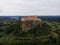 Aerial panorama view of historic old medieval castle Riegersburg on cliff top of mountain hill in Styria Austria alps