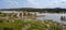 Aerial panorama view of the historic Ponte de Ajuda bridge over the Guadiana River