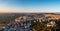 Aerial panorama view of the village of Morrovalle in Marche Province in Italy in warm evening light