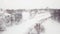 Aerial panorama view winter village snowfall landscape with church monastery religious architecture