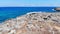 Aerial panorama on young woman on sea beach, Crete, Greece