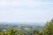 Aerial panoramal of Novi Sad, seen from a hill of Fruska Gora National park during a summer afternoon.