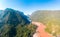 Aerial panoramic Nam Ou River Nong Khiaw Muang Ngoi Laos, dramatic landscape scenic pinnacle cliff mountain range famous travel